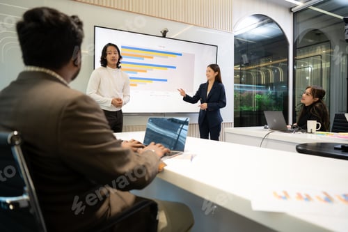 Preview: Business people having a meeting and present in a conference room at the office.