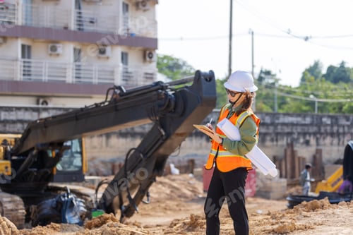 Preview: A female engineer inspects a construction site