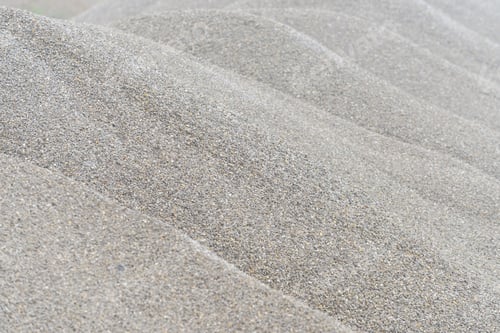 Preview: Large pile of gray gravel stone as road construction material as natural background