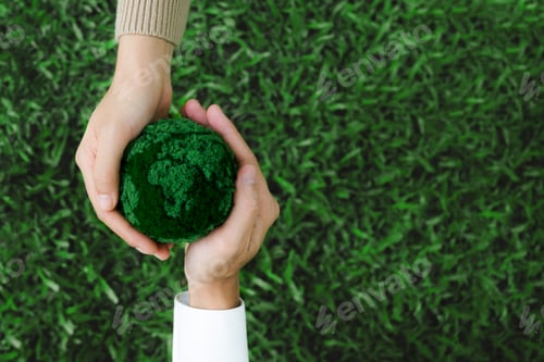 Preview: Two hands holding green earth together for the Sustainable Development Goals. Responsibility.