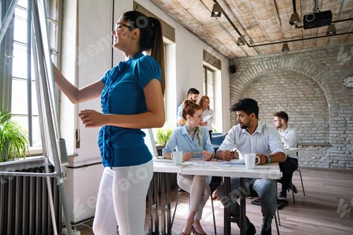 Preview: Successful business people presenting analytical report while working together in the office