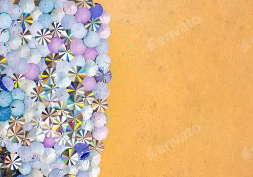 Preview: Aerial top view of a relaxing beach site with many rows of chairs and umbrellas. Summer season