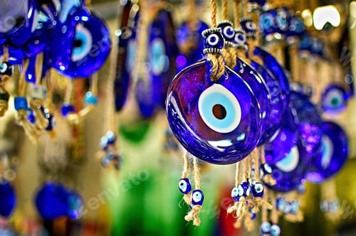 Preview: Closeup shot of blue evil eye ornaments at a market