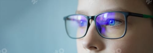 Preview: close up part child's face, eyes of boy in glasses, concept vision examination, diagnosis