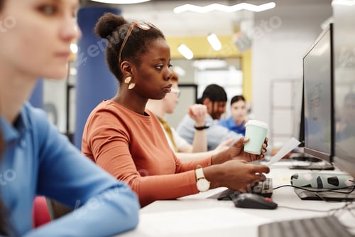 Preview: Young Woman in Computer Lab