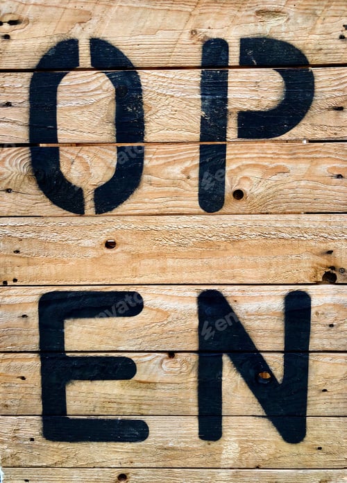Preview: Photo of a wooden sign saying open