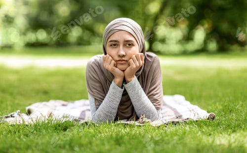 Preview: Upset muslim girl spending time at park, feeling lonely