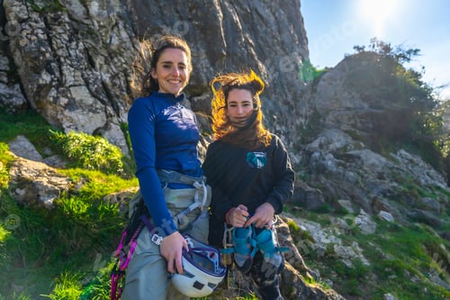 Preview: Young women embracing adventure while rock climbing