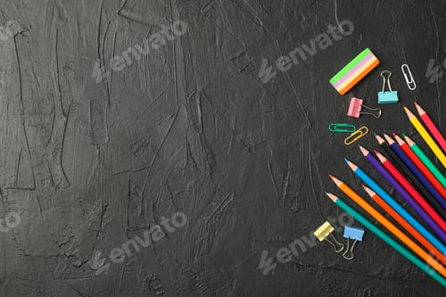 Preview: Composition with school supplies on black background, space for text