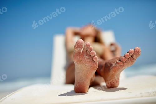 Relaxing on a Beach Lounge Chair