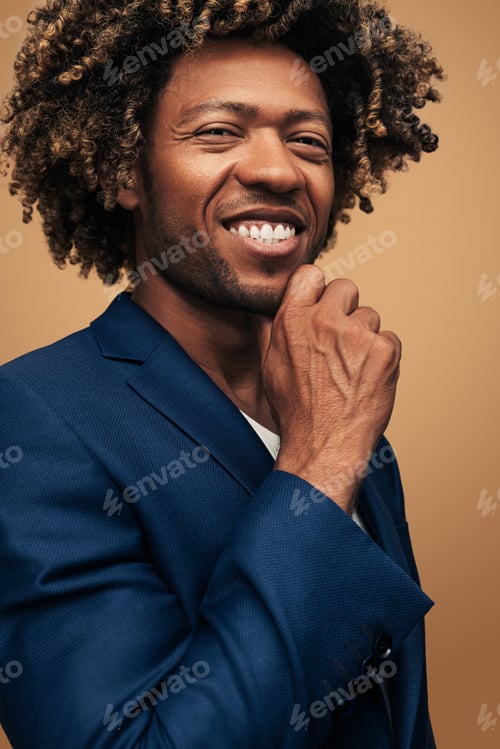 Preview: Happy black businessman touching chin