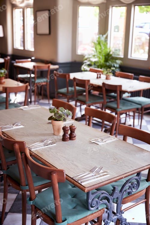 Preview: Tables Laid For Service In Empty Restaurant