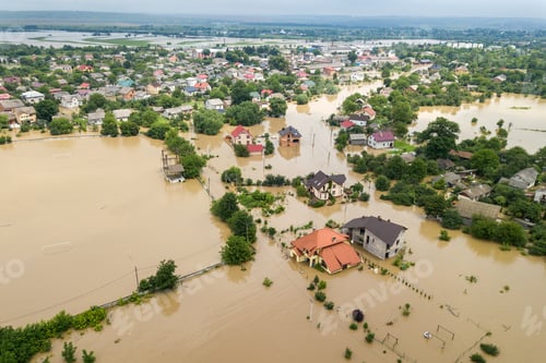 Preview: Aerial view of flooded houses with dirty water of Dnister river in Halych town, western Ukraine.