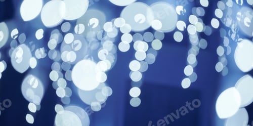 Preview: Blue lights bokeh from christmas holiday garlands, blurred festive background, abstract lights