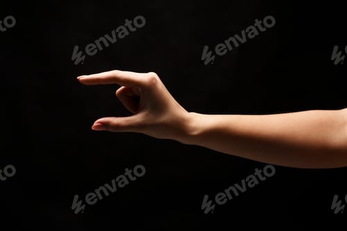 Preview: Female hand measuring something, cutout, gesture