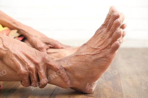 Preview: Close up on senior women feet and hand massage on injury spot.
