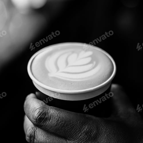 Preview: African Coffee Barista holding a take away cup
