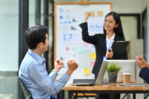 Preview: Happy business team excited by good news online on laptop, celebrating project success