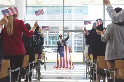 Preview: Businessman speaks in business seminar in office building