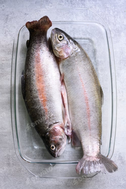 Preview: Three trout fish on white plate