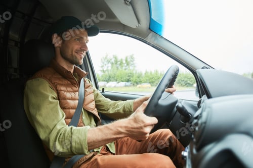 Preview: Smiling Man Driving Truck