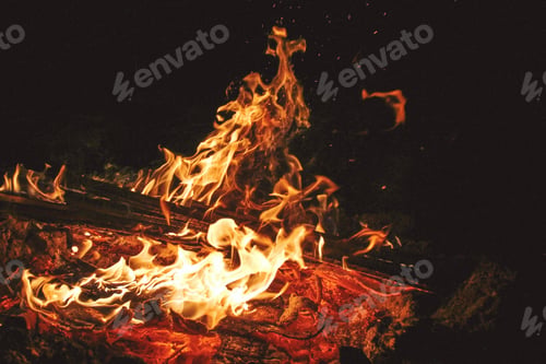Preview: Title: War fire in the night. Close-up flame, bonfire at the beach #003