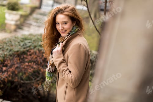 Preview: Young red hair woman at outdoors