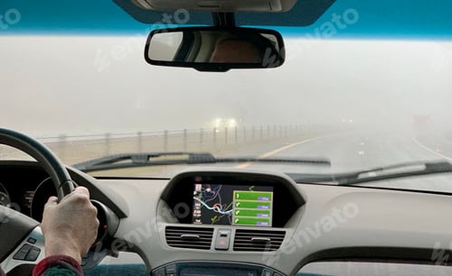 Preview: Interstate road trip on a foggy rainy day. Caution driving is necessary under bad weather conditions