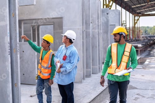 Preview: At building construction site supervisor check quality precast concrete panel before installation