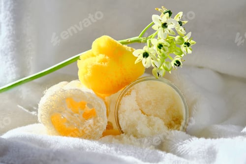 Preview: Scrub, loofah washcloth and organic sea sponge on the towel.