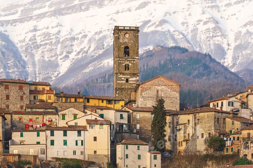 Preview: Coreglia Antelminelli village and snowy mountains in the background. Garfagnana, Tuscany, Italy.