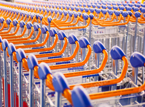 Preview: Rows of airport luggage trollies