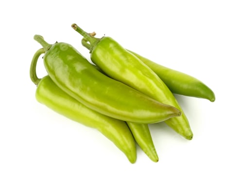 Preview: Green fresh jalapeno peppers close up on white