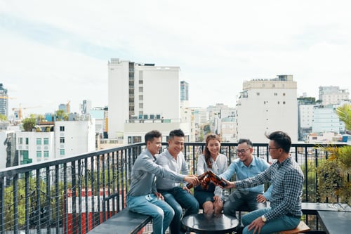 Preview: Business people celebrating successful meeting