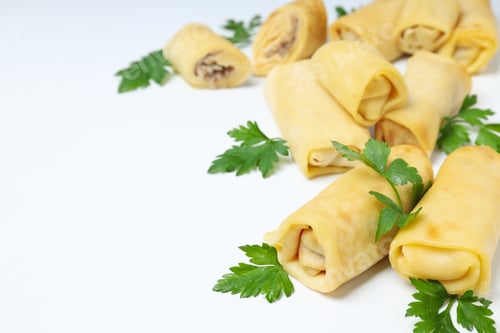 Preview: Concept of tasty food, thin pancakes with filling, space for text
