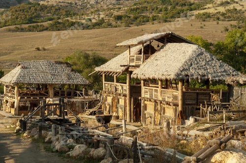 Preview: Small little village with Viking houses on the coast of a lake