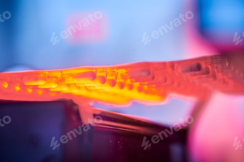 Preview: Tablet casing being manufacturered on a rolling belt machine for medical research