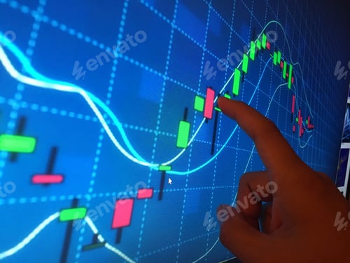 Preview: Hand pointing on charts on screen