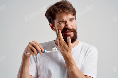 Preview: bearded man hygiene toothpaste morning light background
