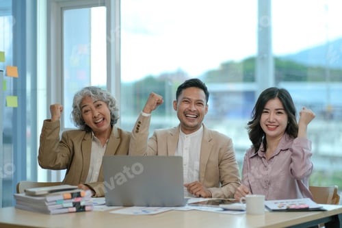 Preview: Group of Young Asian business team creative businesspeople coworker in office Happy to be successful