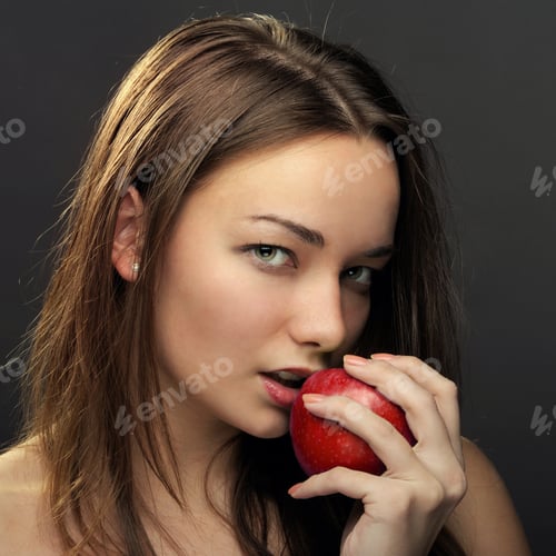 Preview: Beautiful Woman Posing With Red Apple