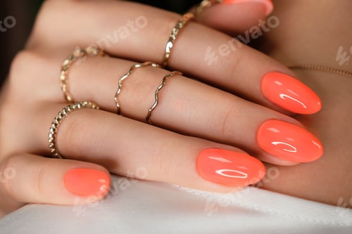 Preview: Bright neon manicure on female hands with accessories. Nail design.