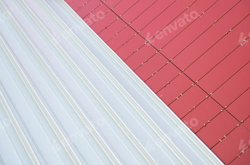 Preview: Junction of two textures: red metal rightangled tiles and white metal corrugated sheet