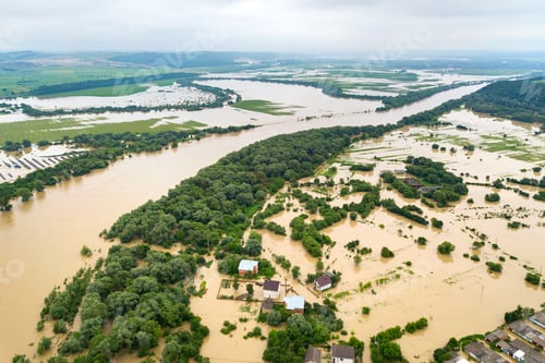 Preview: Aerial view of Dnister river with dirty water and flooded houses in Halych town, western Ukraine.