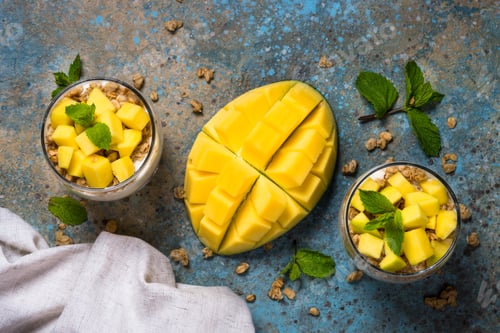 Preview: Parfait with yogurt, mango and granola top view
