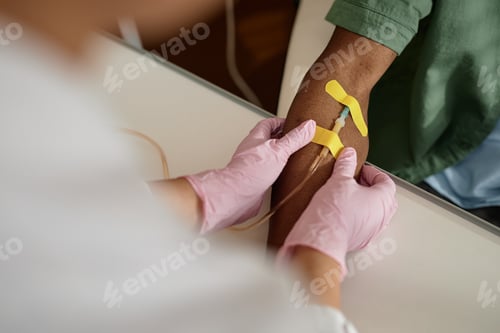 Preview: Doctor Putting Bandage on Arm