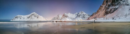 Preview: Fabulous winter scenery on Skagsanden beach at night with starry sky.