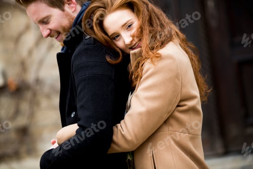 Preview: Young loving couple outdoor