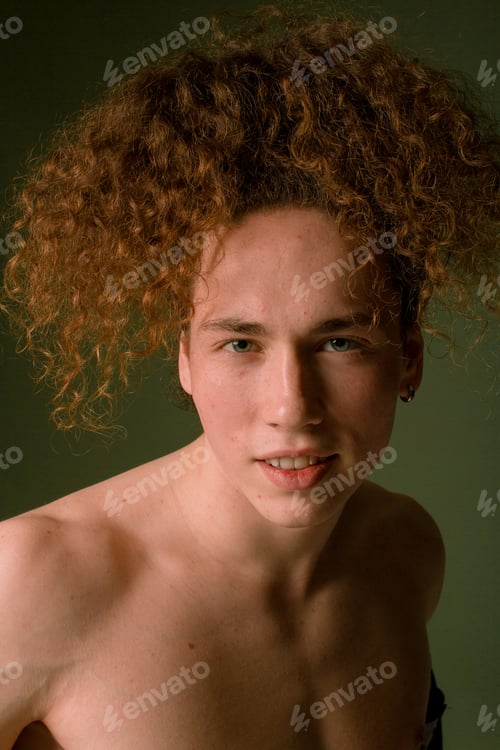 Preview: Attractive And Stylish Guy With Curly Hair And A Sports Figure