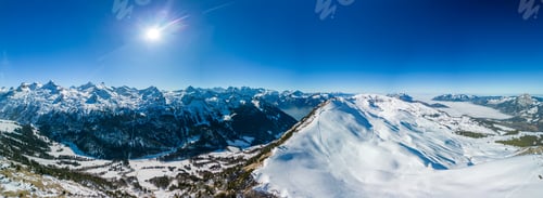 Preview: Aerial drone view of snow covered ski slopes at Stoos,Switzerland
